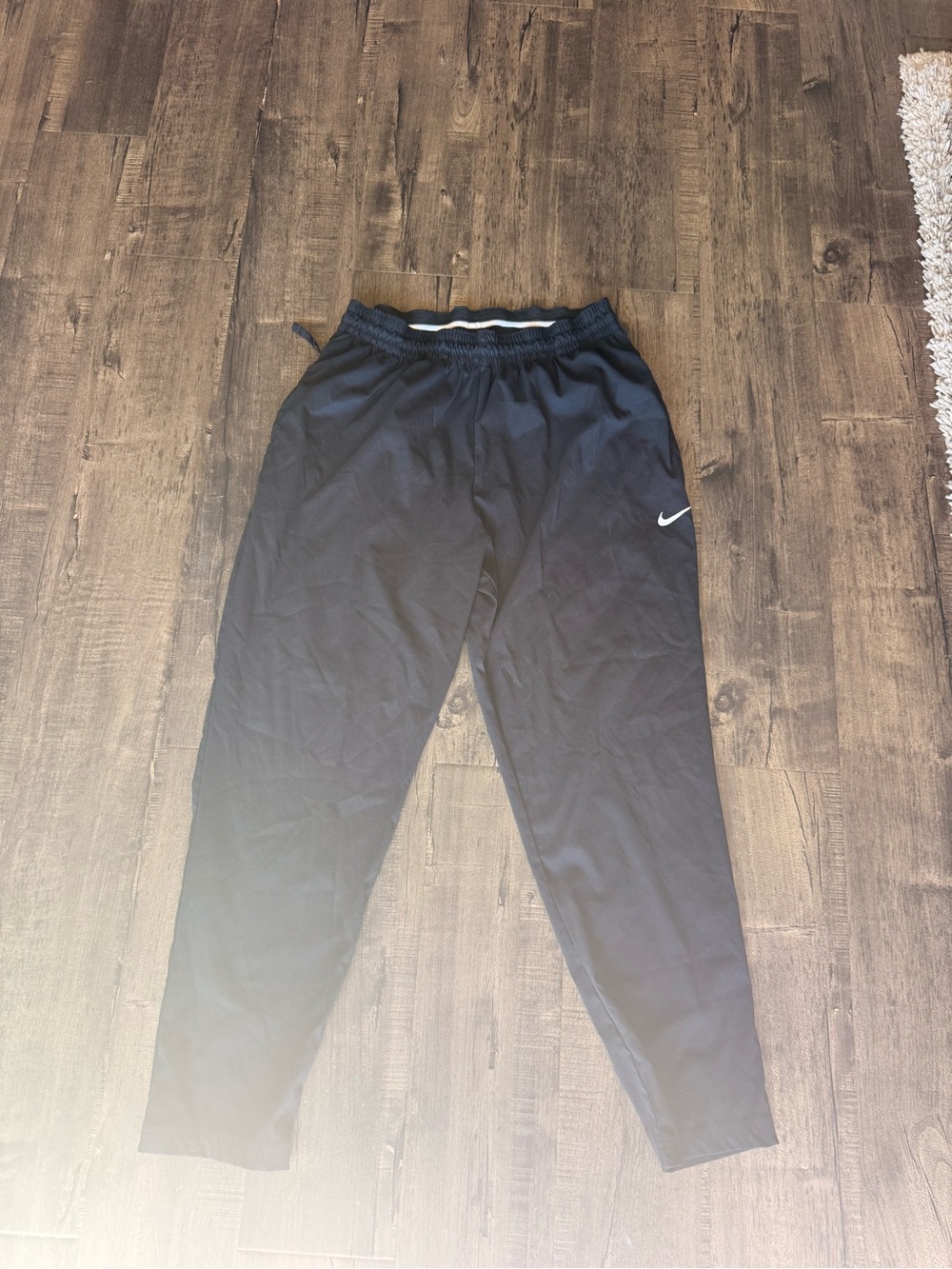 Nike Men's Black Jogger Sweatpants with White Swoosh